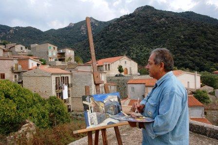 Il pittore Antioco Lostia durante la 'Tre giorni di pittura' 2005 (foto G. Murgia)